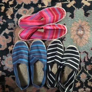 Three pair French Espadrilles brightly colored.